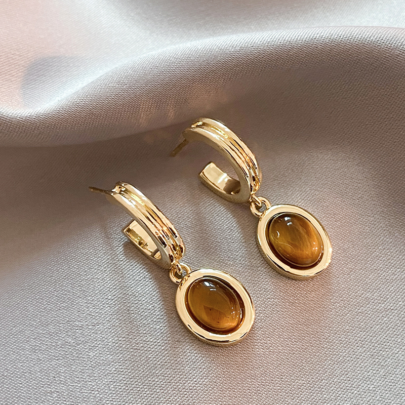 Elegante øreringe i orange krystal og guld